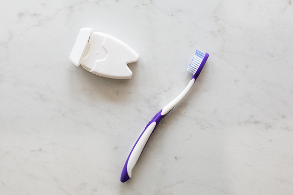General dentistry toothbrush and floss